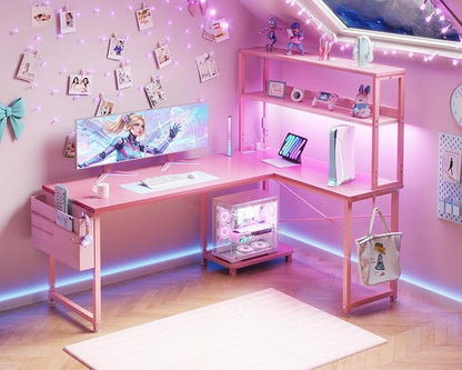 ODK 53" L Shaped Gaming Desk with Shelves, LED & Outlets, Pink | Headset hook. Storage bag. Shelves for makeup & gaming gear. LED for late-night gaming. Reversible. Fits dual monitors.