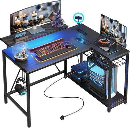 Bestier 42-Inch L-Shaped Computer Desk with Charging & LED, Black | Charging 2AC+USB+Type-C, RGB LED Strip, Reversible Shelves, Monitor Stand, Headphone Hook, Cable Mgmt, Small Space